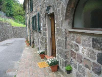 Casa Sotto La Rocca Villa ราดิโกฟานี ภายนอก รูปภาพ